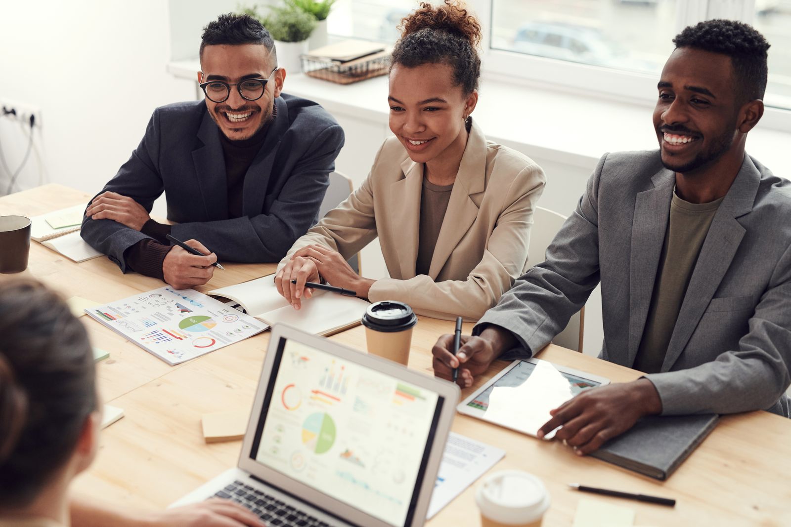 A team collaborating around a shared business system